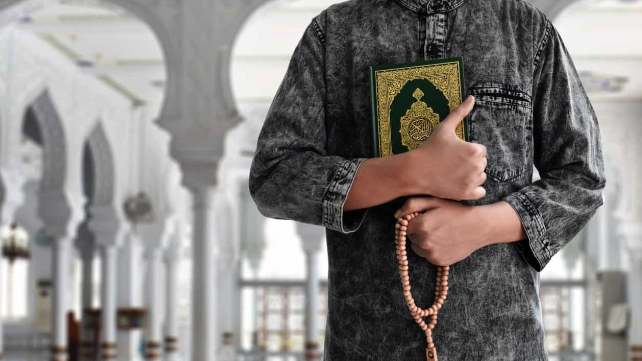 Мужчина с Кораном