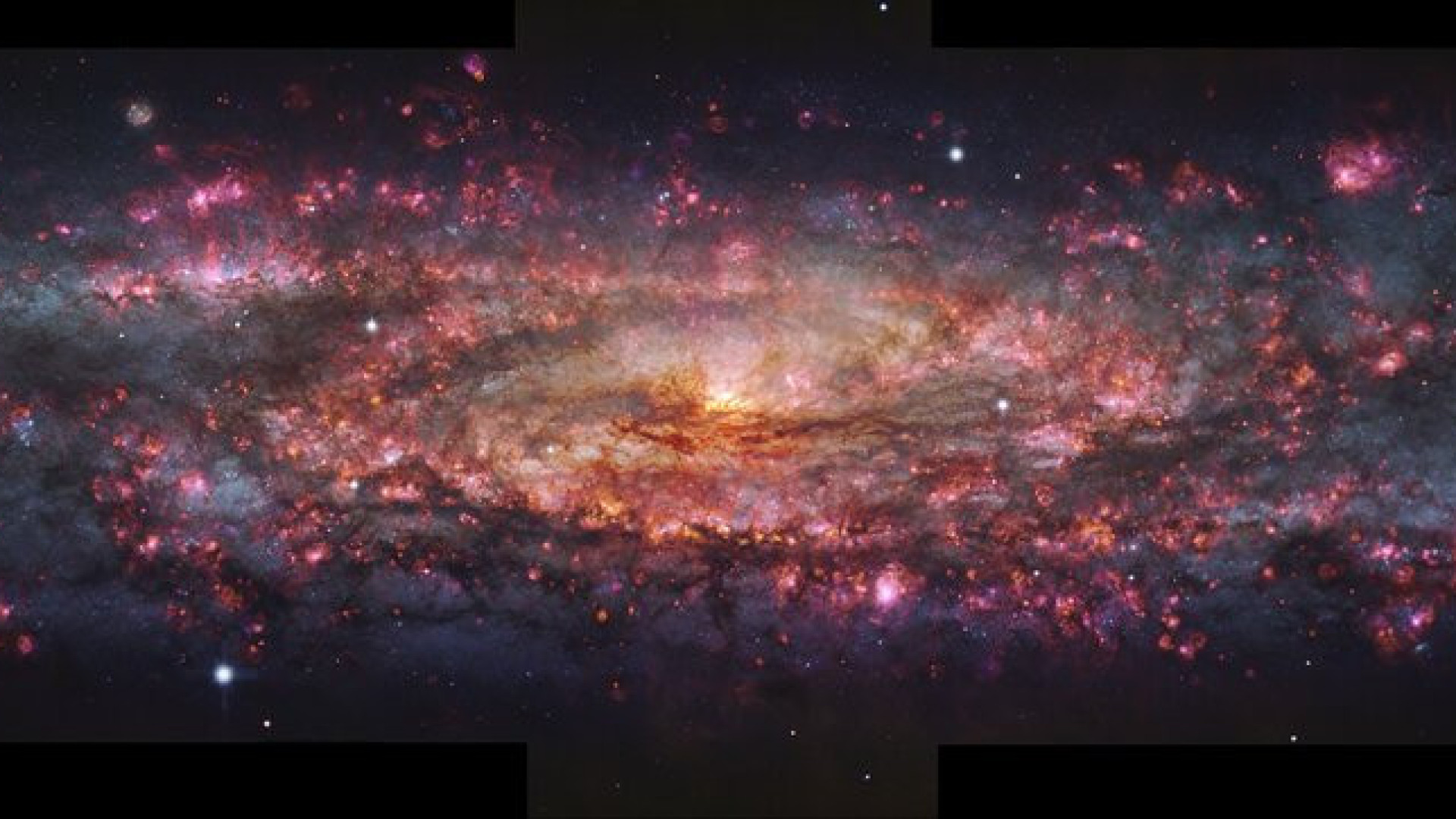 Astrónomos observam Galáxia do Escultor em milhares de tons em simultâneo