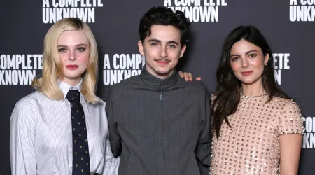 O look andrógeno de Elle Fanning em evento de 'Um Completo Desconhecido'