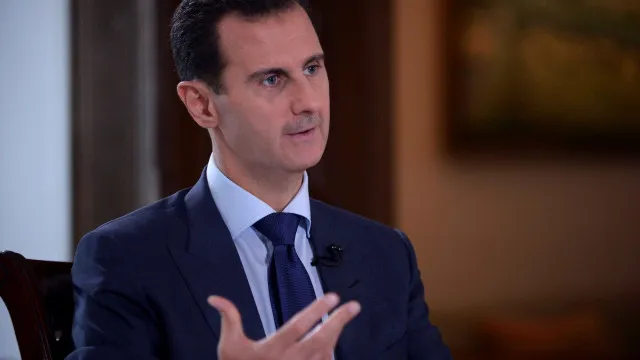 
                    Síria detém primo de Al Assad e 13 pessoas por crimes
                
