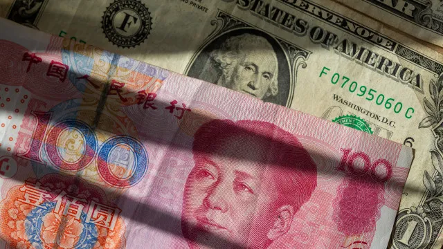 
                    China prepara sistema de pagamentos para reduzir dependência do dólar
                
