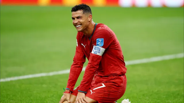 
                    13.º dia do Mundial em imagens: O sorriso de CR7 e uma pedra no sapato
                