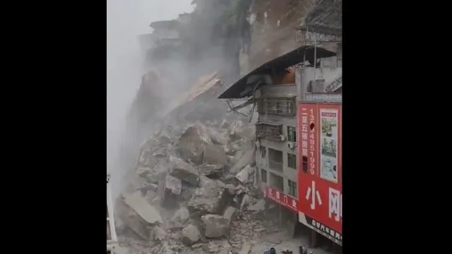 Deslizamento de terras na China soterra edifÃcios. Procuram-se vÃtimas