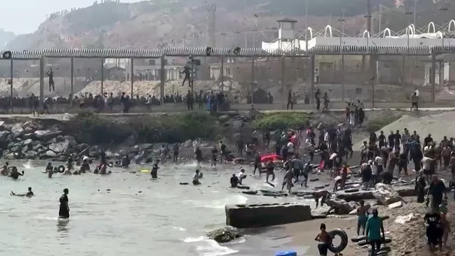
                    Nove migrantes morreram ao tentar chegar a nado ao enclave de Ceuta
                