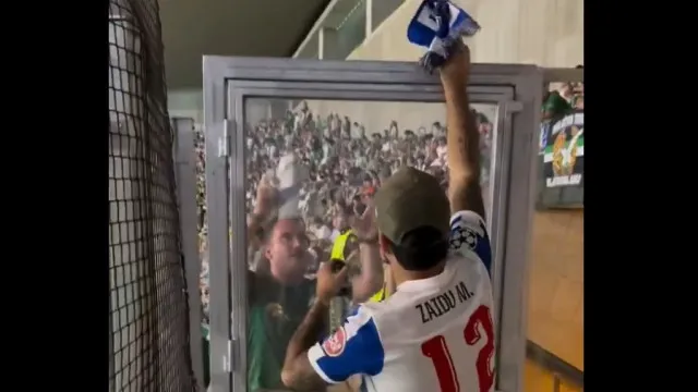 
                    Momento entre adepto do FC Porto e do Betis está a conquistar a Internet
                