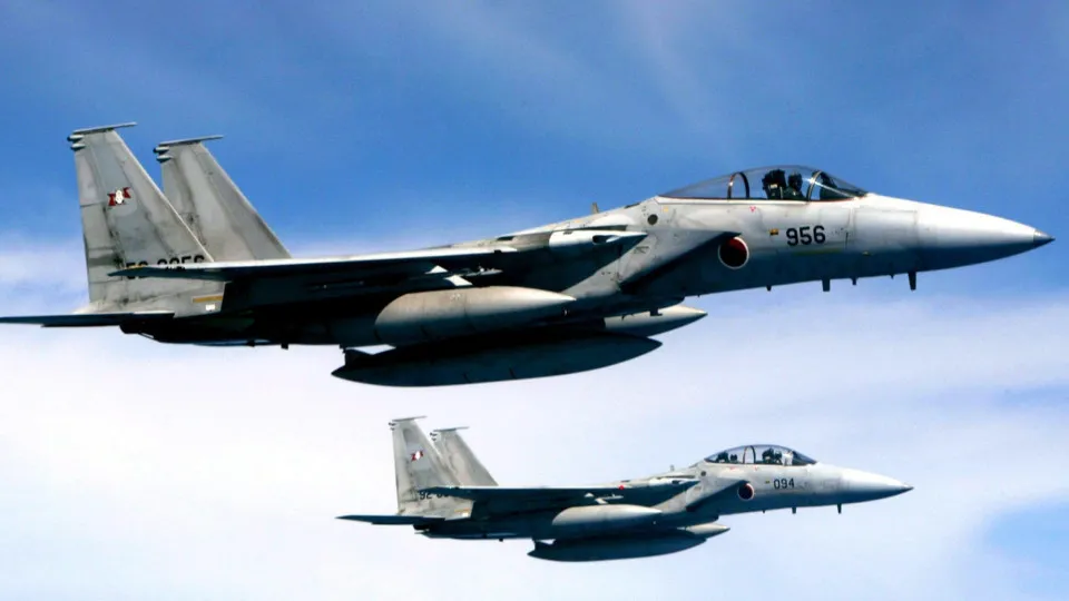 Japan says Chinese aeroplane, ships encroach on disputed islands
