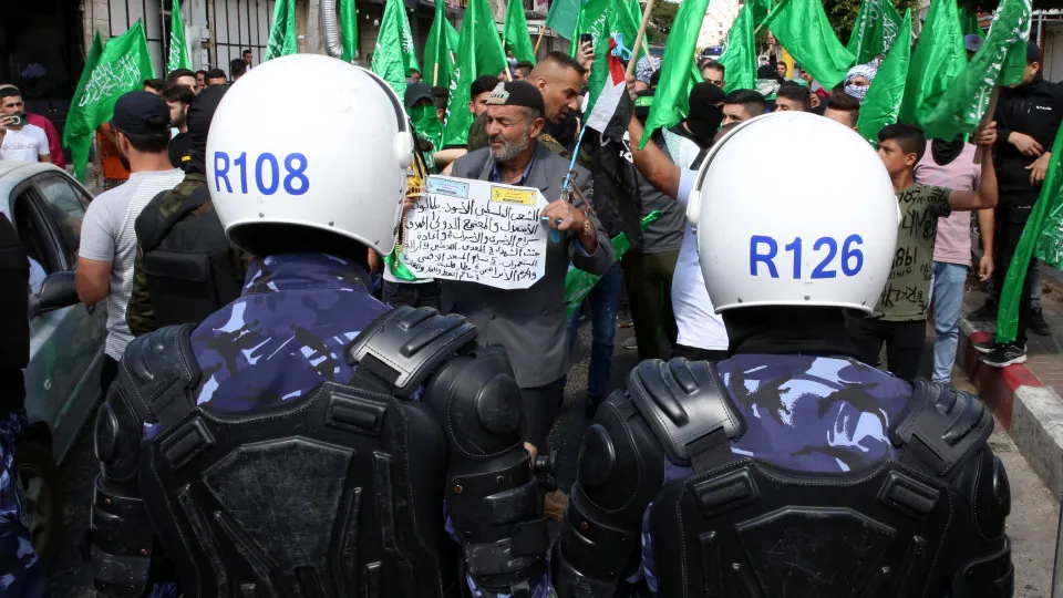 Palestinian Authority's security forces disperse a Hamas protest in Hebron