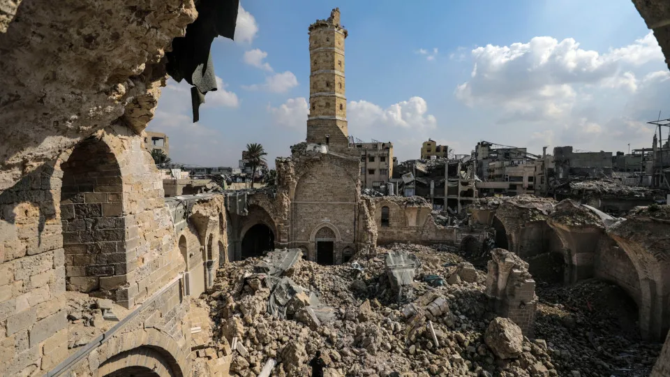 Palestinians gather at destroyed Great Omari Mosque in Gaza