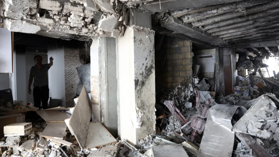 Iranians inspect the damage in Tehran as Iran-Israel ceasefire holds