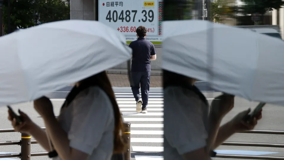 Japan's Nikkei stock index hits 11-month high