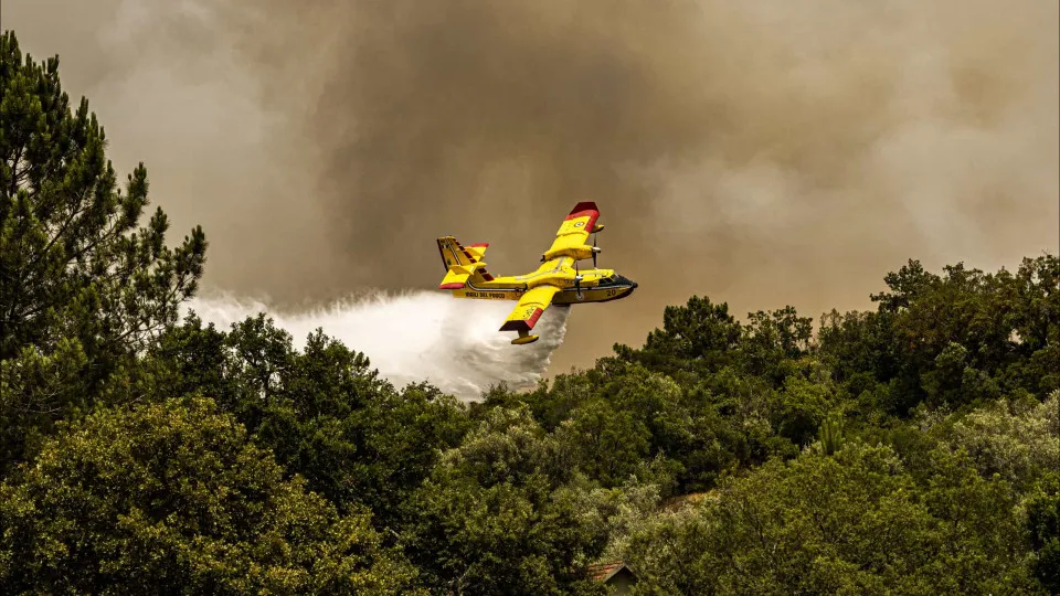 POMBAL, PORTUGAL - JULY 14: A Canadair CL-415 fire-fighting aircraft from Italy takes part in firefighting operations at Gesteira de Baixo on July 14, 2022 in Pombal, Portugal. Wildfires have swept across the central part of the country amid temperatures 