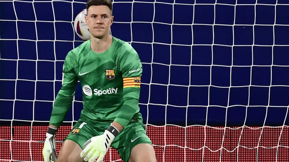 Barcelona's German goalkeeper #01 Marc-Andre ter Stegen reacts to conceding a goal scored by Osasuna's Argentinian forward #09 Ezequiel "Chimy" Avila during the Spanish Liga football match between CA Osasuna and FC Barcelona at El Sadar stadium in Pamplon