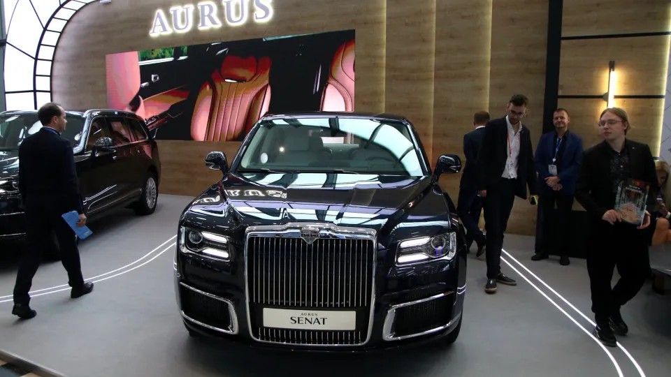 Presentation of the Aurus brand car at the stand of the...