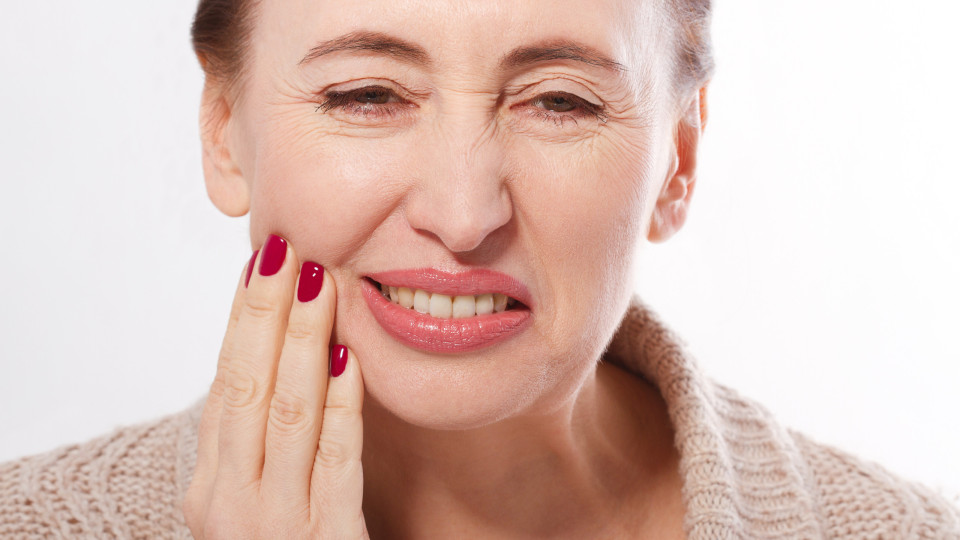 Os problemas que a menopausa pode trazer à sua saúde oral