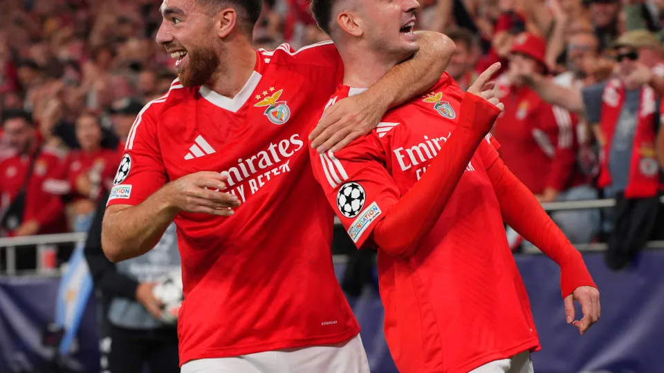 LISBON, PORTUGAL - OCTOBER 2:  Kerem Akturkoglu of SL Benfica celebrates with teammate Orkun Kokcu of SL Benfica after scoring a goal during the UEFA Champions League 2024/25 League Phase MD2 match between SL Benfica and Atletico de Madrid at Estadio da L