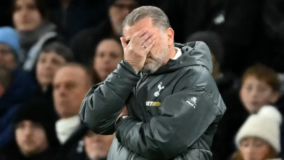 The score at 3-6, Tottenham Hotspur's Greek-Australian Head Coach Ange Postecoglou reacts on the touchline during the English Premier League football match between Tottenham Hotspur and Liverpool at the Tottenham Hotspur Stadium in London, on December 22,