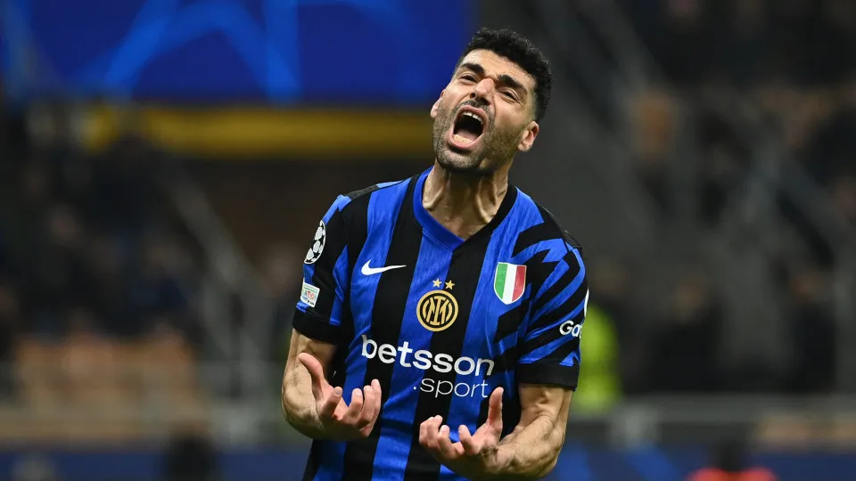 Inter Milan's Iranian forward #99 Mehdi Taremi reacts after missing a goal opportunity  during the UEFA Champions League round of 16 second-leg football match between Inter Milan and Feyenoord Rotterdam at the San Siro Stadium in Milan, on March 11, 2025.