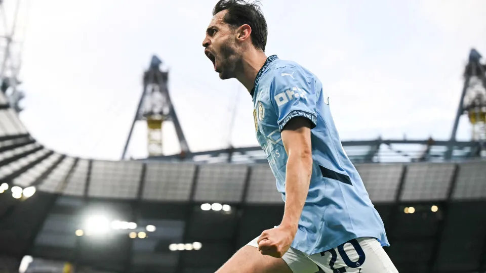 Manchester City's Portuguese midfielder #20 Bernardo Silva celebrates after scoring his team second goal during the English Premier League football match between Manchester City and Bournemouth at the Etihad Stadium in Manchester, north west England, on M