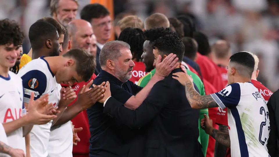 BILBAO, SPAIN - MAY 21: Ange Postecoglou, Manager of Tottenham Hotspur, embraces Ruben Amorim, Manager of Manchester United, during the runners up medal ceremony after the UEFA Europa League Final 2025 between Tottenham Hotspur and Manchester United at Es