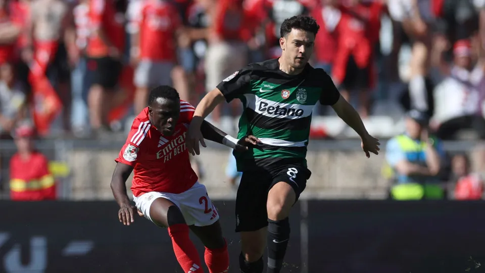 Benfica's Portuguese forward #27 Bruma fights for the ball with Sporting Lisbon's Portuguese forward #08 Pedro Goncalves during the 'Taca de Portugal' (Portugal's Cup) final football match between SL Benfica and Sporting CP at Jamor stadium in Oeiras, on 