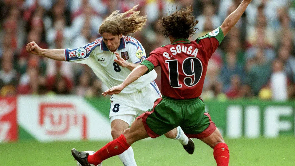 BIRMINGHAM, ENGLAND - June 23: Karel Poborski of Czech Republic and Paulo Sousa of Portugal challenge during the UEFA Euro 1996 Quarter Final match between Czech Republic and Portugal at Villa Park on June 23, 1996 in Birmingham, England. (Photo by Paul M