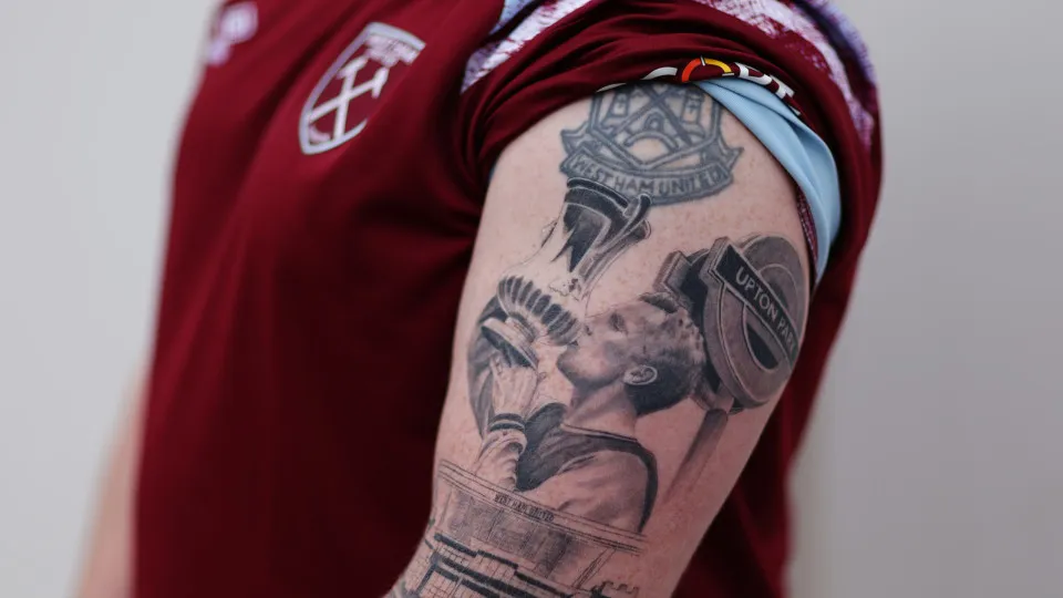 LONDON, ENGLAND - APRIL 16: Detailed view of tattoos on a West Ham United fan featuring Bobby Moore and Upton Park prior to the Premier League match between West Ham United and Arsenal FC at London Stadium on April 16, 2023 in London, England. (Photo by A