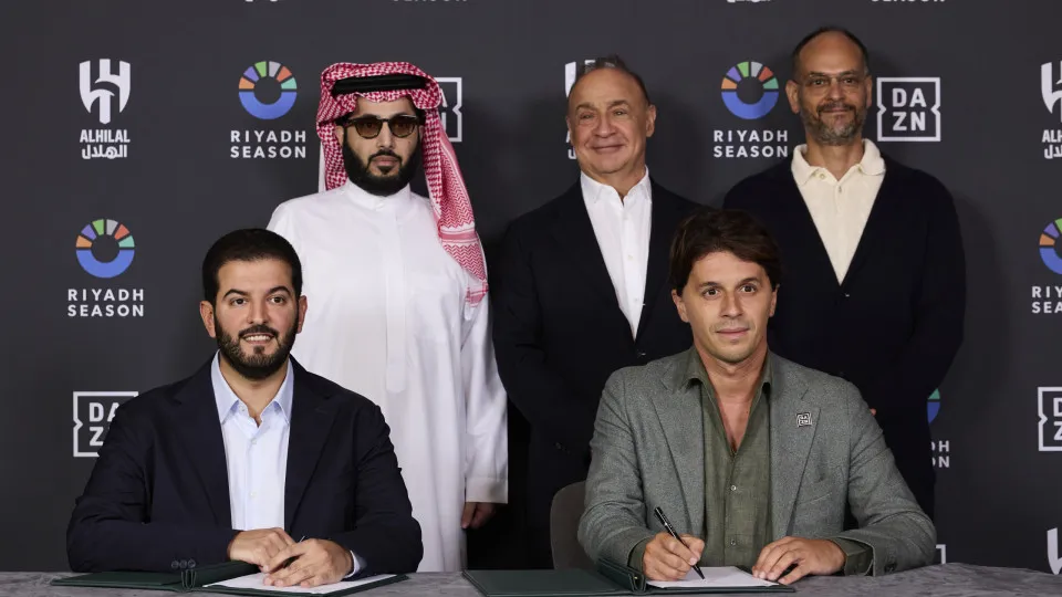 LONDON, ENGLAND - SEPTEMBER 24: (Back Row L-R) His Excellency Turki Alashikh, Sir Len Blavatnik - DAZN Group and Mr Abdulmajid Al-Haqbani Vice President Al-Hilal SFC, (Front Row L-R)  Mr Fahad Bin Nafel Chairman of Board Al-Hilal SFC and Kacy Grine - Pres