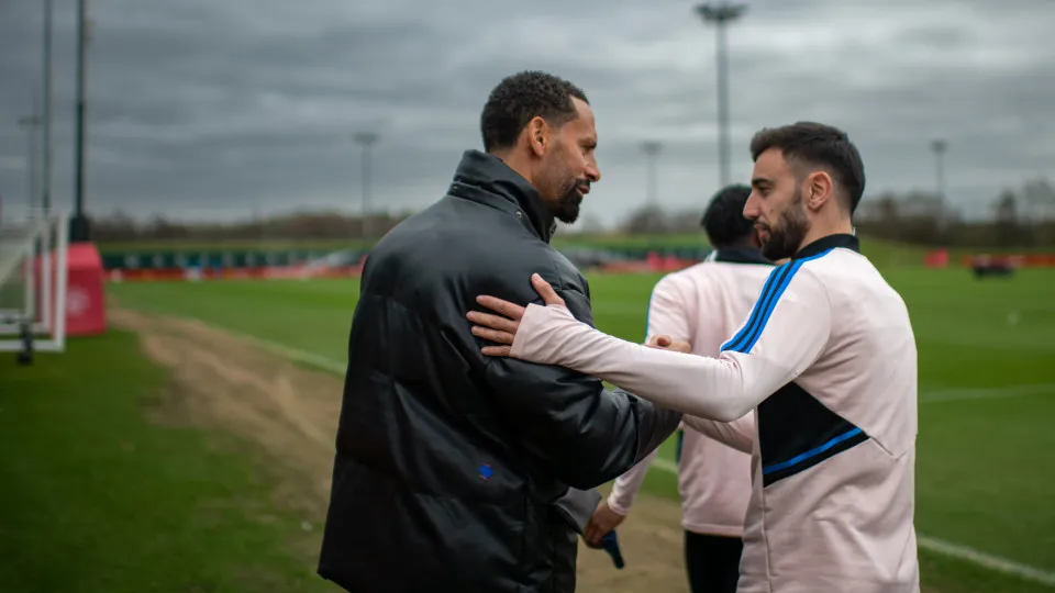 MANCHESTER, ENGLAND - FEBRUARY 20:  Bruno Fernandes of Manchester United reacts to Rio Ferdinand during a first team training session at Carrington Training Ground on February 20, 2023 in Manchester, England. (Photo by Ash Donelon/Manchester United via Ge