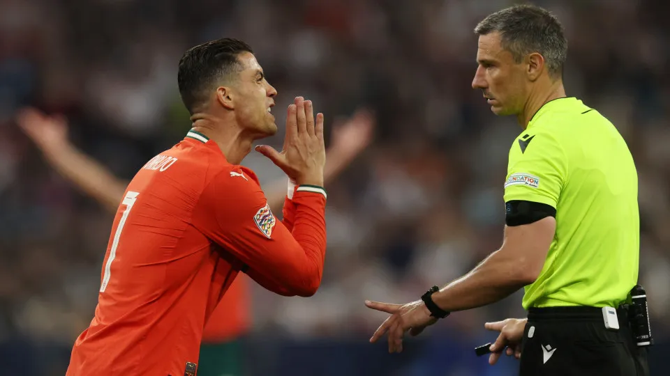 MUNICH, GERMANY - JUNE 04: Cristiano Ronaldo of Portugal reacts towards Referee Slavko Vincic during the UEFA Nations League 2025 semifinal match between Germany and Portugal at Munich Football Arena on June 04, 2025 in Munich, Germany. (Photo by Alexande
