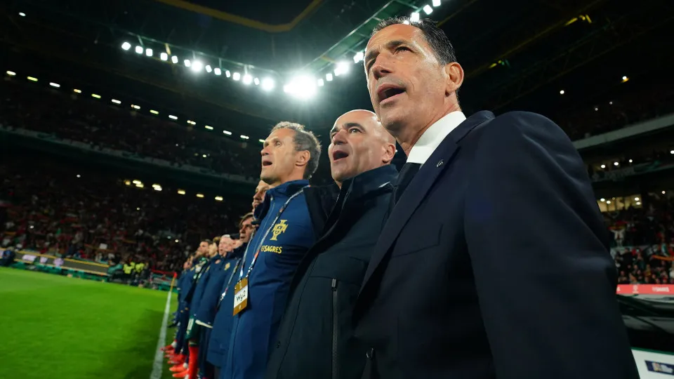 LISBON, PORTUGAL - MARCH 23: President Pedro Proenca of Portugal and Head Coach Roberto Martinez of Portugal during the National anthem before the start of the UEFA Nations League Quarterfinal Leg Two match between Portugal and Denmark at Estadio Jose Alv