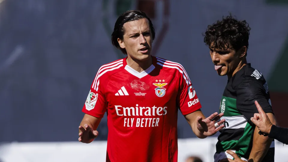 LISBON, PORTUGAL - MAY 25: Álvaro Carreras of Benfica (C) reacts while Samuel Dahl of Benfica (L) lies injured during the Portuguese Cup final match between SL Benfica and Sporting CP at Estadio Nacional do Jamor on May 25, 2025 in Lisbon, Portugal. (Phot