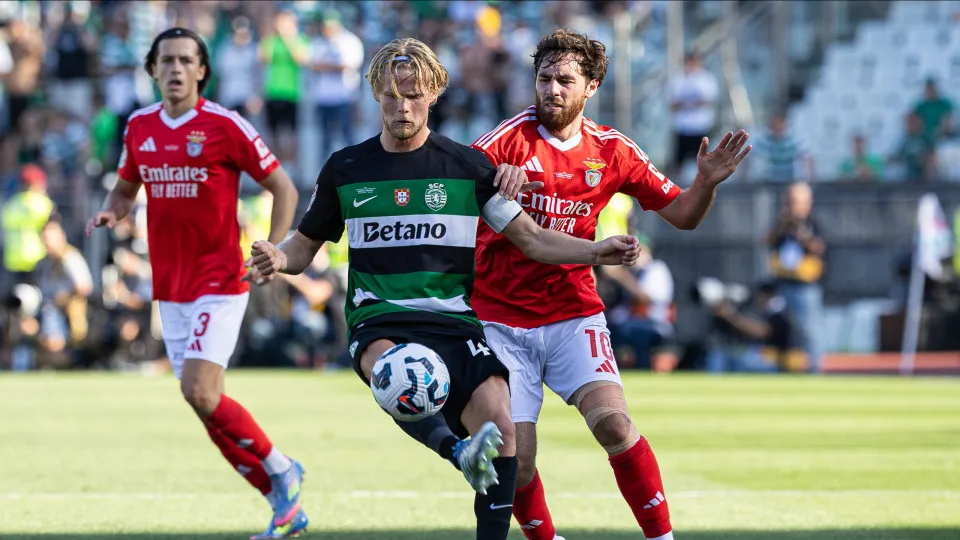 OEIRAS, PORTUGAL - 2025/05/25: Morten Hjulmand of Sporting  and Orkun Kokcu of SL Benfica seen in action during the Portuguese Cup 2024/2025 - Final match between SL Benfica and Sporting  at Estadio Nacional. (Final score: SL Benfica 1 - 3 Sporting 