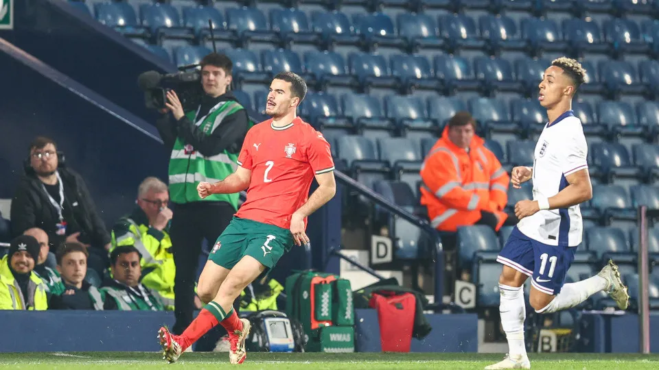 Rodrigo Pinheiro of Portugal U21s and Omari Hutchinson of England U21s are in action during the Under 21 International Friendly match between England and Portugal at The Hawthorns in West Bromwich, England, on March 24, 2025. (Photo by MI News/NurPhoto vi