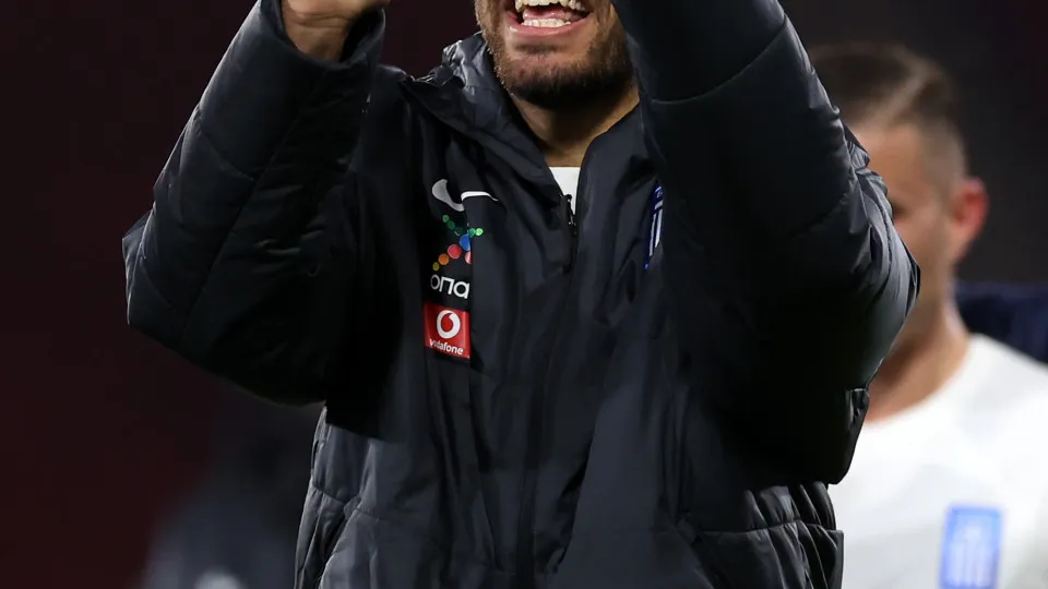 GLASGOW, SCOTLAND - MARCH 23: Vangelis Pavlidis of Greece applauds the fans after the team's victory in the UEFA Nations League 2024/25 League A/B Play-offs Second Leg match between Scotland and Greece at Hampden Park on March 23, 2025 in Glasgow, Scotlan