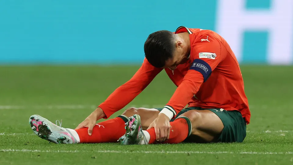 MUNICH, GERMANY - JUNE 08: Cristiano Ronaldo of Portugal reacts following an injury during the UEFA Nations League 2025 final match between Portugal and Spain at Munich Football Arena on June 08, 2025 in Munich, Germany. (Photo by Alexander Hassenstein/Ge
