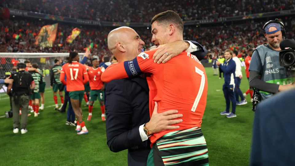 MUNICH, GERMANY - JUNE 08: Roberto Martinez, Manager of Portugal and Cristiano Ronaldo of Portugal celebrate victory in the UEFA Nations League 2025 final match between Portugal and Spain at Munich Football Arena on June 08, 2025 in Munich, Germany. (Phot