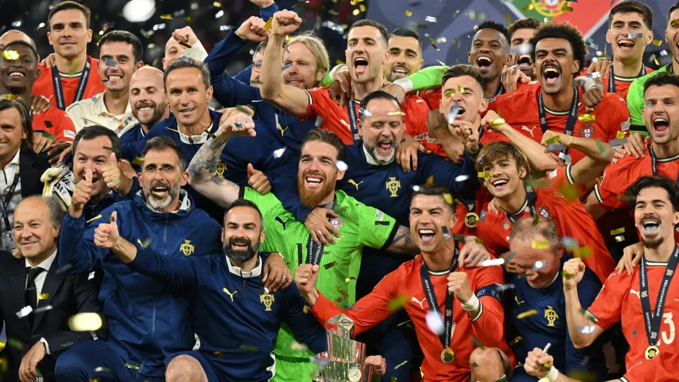 MUNICH, GERMANY - JUNE 08: Cristiano Ronaldo and team mates of Portugal pose for a photo with the UEFA Nations League trophy after their victory in the UEFA Nations League 2025 final match between Portugal and Spain at Munich Football Arena on June 08, 20