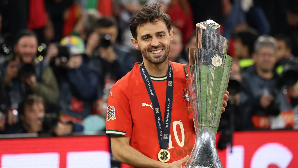 MUNICH, GERMANY - JUNE 08: Bernardo Silva of Portugal poses for a photograph with the UEFA Nations League trophy after his team's victory in the UEFA Nations League 2025 final match between Portugal and Spain at Munich Football Arena on June 08, 2025 in M