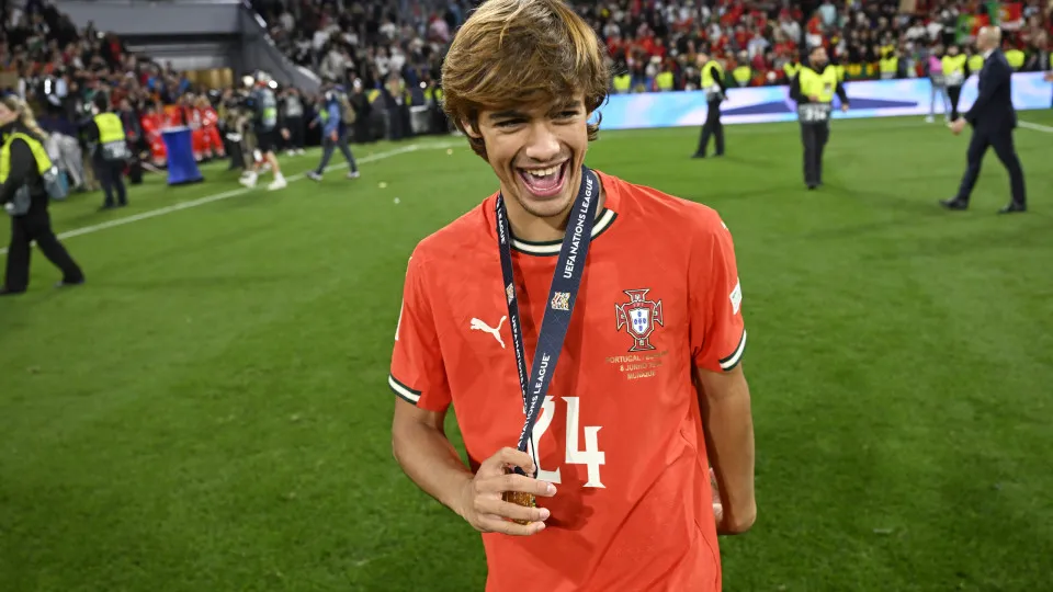 MUNICH, GERMANY - JUNE 08: Rodrigo Mora of Portugal holds he medal as he celebrates victory following the UEFA Nations League 2025 final match between Portugal and Spain at Munich Football Arena on June 08, 2025 in Munich, Germany. (Photo by Kristian Skei