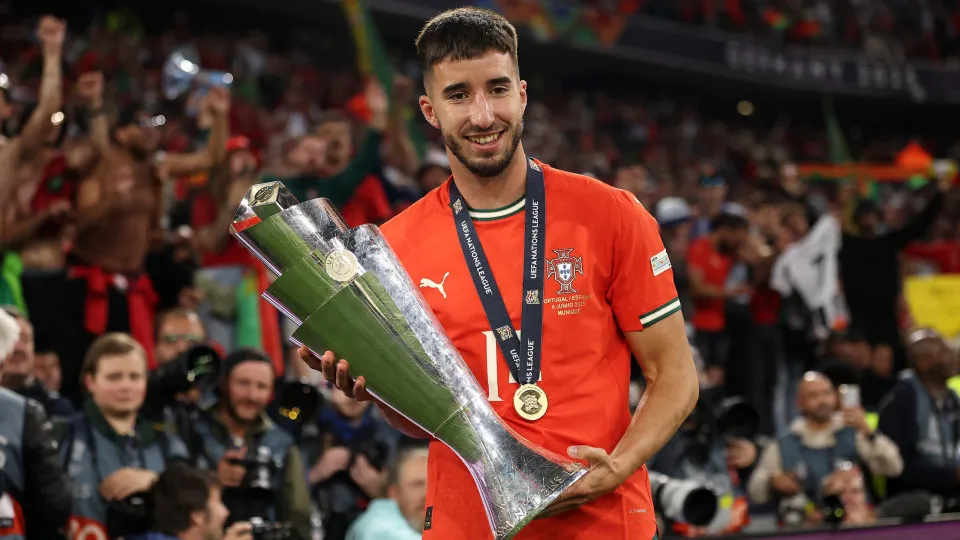 MUNICH,  - JUNE 08: Goncalo Inacio of Portugal poses for a photograph with the UEFA Nations League trophy after his team's victory in the UEFA Nations League 2025 final match between Portugal and Spain at Munich Football Arena on June 08, 2025 in M