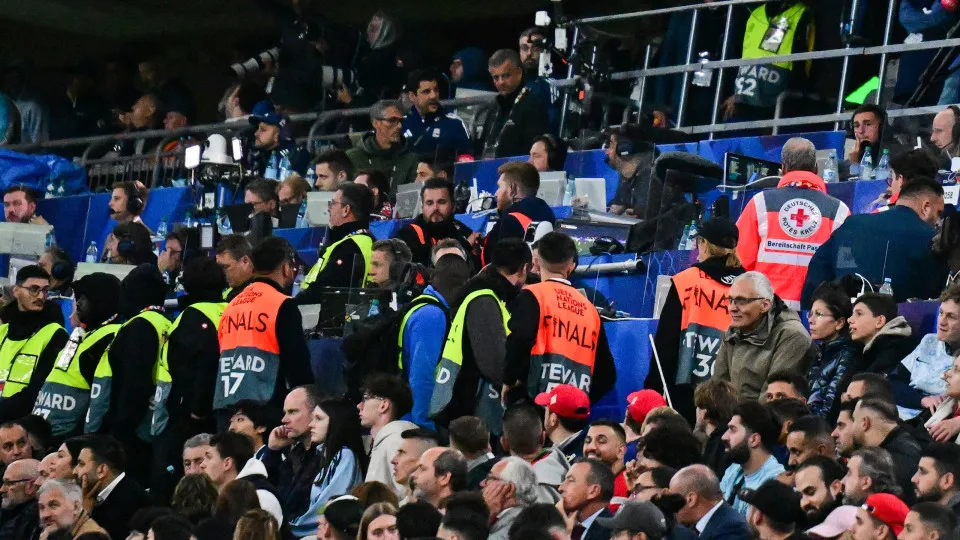 Medics and stewards are seen in the stands after a medical incident occurred during the UEFA Nations League final football match between Portugal and Spain in Munich, southern  on June 8, 2025. (Photo by Tobias SCHWARZ / AFP) (Photo by TOBIAS SCHWA