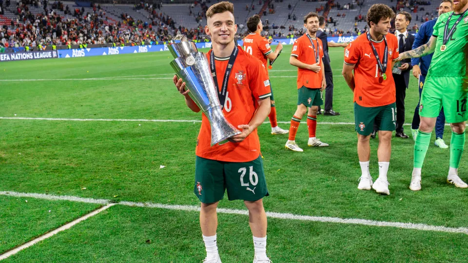 MUNICH,  - 2025/06/09: Francisco Conceicao of Portugal celebrates a win with the trophy during the ceremony after the UEFA Nations League 2025 final match between Portugal and Spain at Munich Football Arena. Final score: Portugal 2:2 (penalties 5:3