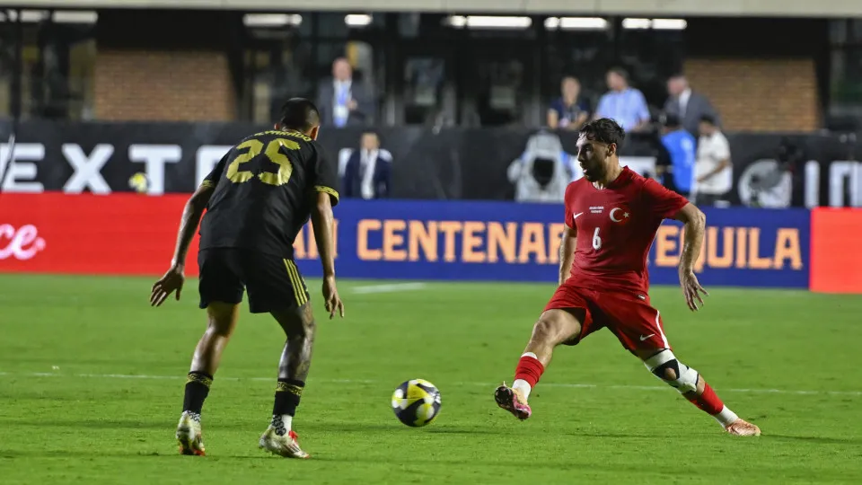 NORTH CAROLINA, UNITED STATES - JUNE 10: Orkun Kokcu (6) of Turkiye in action against Roberto Alvarado (25) of Mexico during the friendly match between Turkiye and Mexico at Kenan Memorial Stadium at Chapel Hill, North Carolina, United States on June 10, 