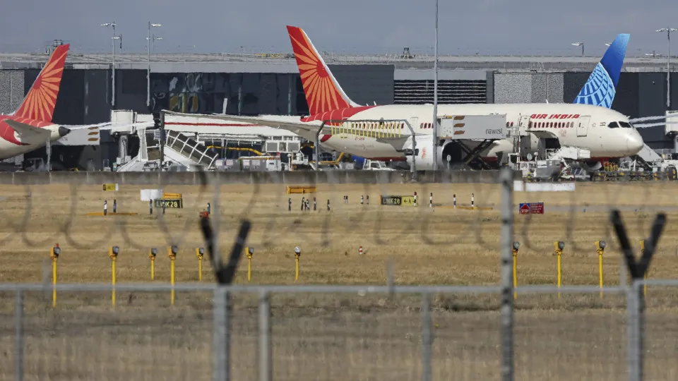 Air India Boeing 787 Dreamliner aircraft as seen at the gates of the terminal of London Heathrow airport during a cloudy day from  Myrtle Avenue, a famous planespotting location. The modern and advanced Boeing Dreamliners are 787-8 wide body passenger pla
