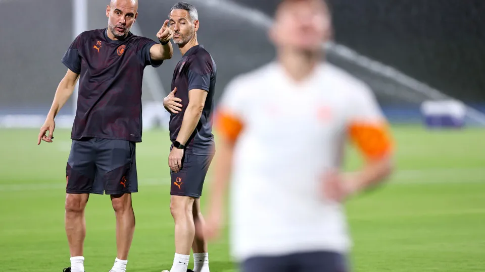 JEDDAH, SAUDI ARABIA - DECEMBER 21: Pep Guardiola the head coach / manager of Manchester City speaks with his assistant Carlos Vicens during the MD-1 training session prior to the FIFA Club World Cup Final match between Manchester City and Fluminense at K
