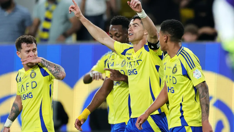 RIYADH, SAUDI ARABIA - APRIL 12: Cristiano Ronaldo of Al Nassr celebrates scoring his team's second goal with teammates during the Saudi Pro League match between Al Nassr v Al Riyadh at Al-Awwal Park on April 12, 2025 in Riyadh, Saudi Arabia. (Photo by Ab