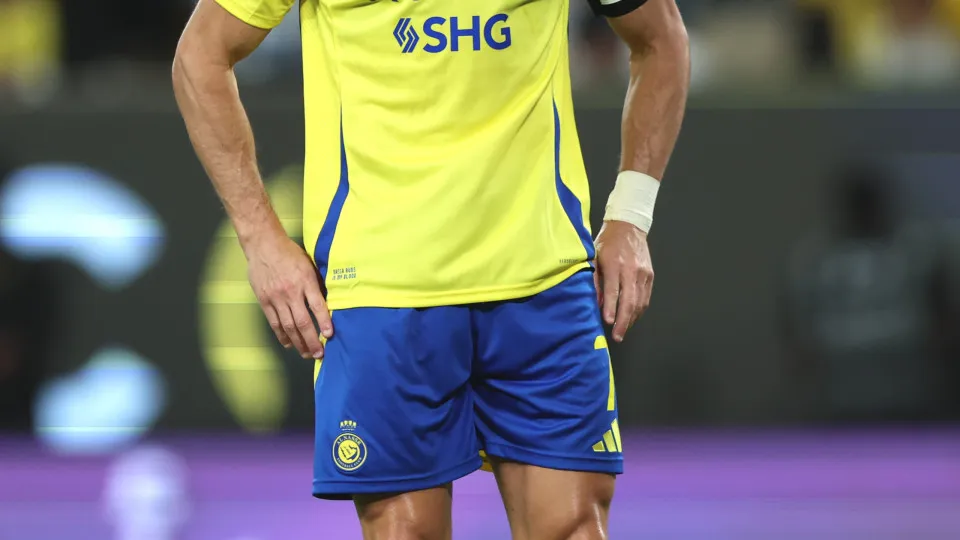 RIYADH, SAUDI ARABIA - MAY 07: Cristiano Ronaldo of Al Nassr reacts after Karim Benzema of Al-Ittihad (not pictured) scores his team's first goal during the Saudi Pro League match between Al Nassr and Al Ittihad at Al-Awwal Park on May 07, 2025 in Riyadh,