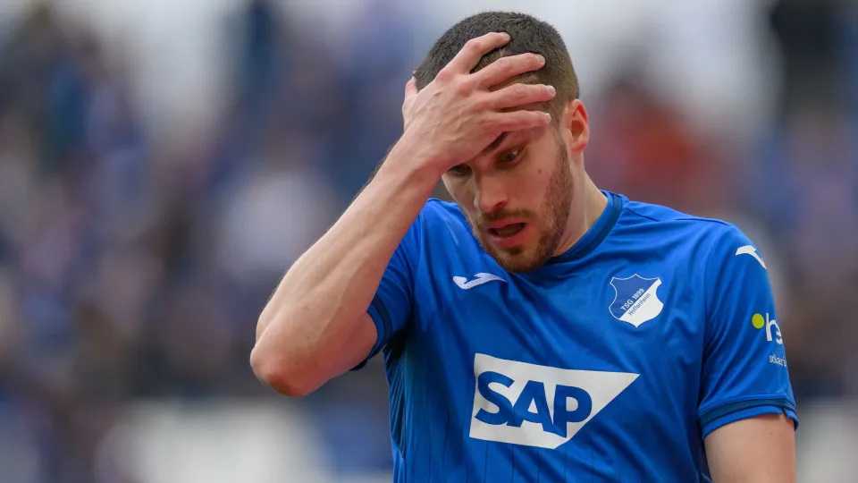 SINSHEIM, GERMANY - MARCH 29: David Jurasek of TSG 1899 Hoffenheim reacts during the Bundesliga match between TSG 1899 Hoffenheim and FC Augsburg at PreZero-Arena on March 29, 2025 in Sinsheim, Germany. (Photo by Christian Kaspar-Bartke/Getty Images)