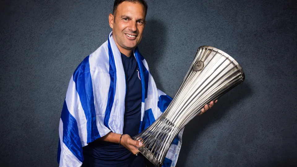 ATHENS, GREECE - MAY 29: Sotiris Silaidopoulos, Assistant Coach of Olympiakos, poses for a portrait with the UEFA Europa Conference League trophy after the UEFA Europa Conference League 2023/24 final match between Olympiacos FC and ACF Fiorentina at AEK A
