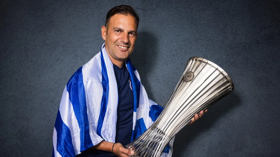 ATHENS, GREECE - MAY 29: Sotiris Silaidopoulos, Assistant Coach of Olympiakos, poses for a portrait with the UEFA Europa Conference League trophy after the UEFA Europa Conference League 2023/24 final match between Olympiacos FC and ACF Fiorentina at AEK A